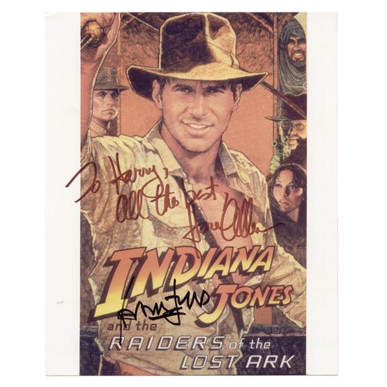 [RAIDERS OF THE LOST ARK]: The first Spielberg/Lucas Indiana Jones film, it became the top grossing film of 1981 and starred Harrison Ford (b. 1942) and Karen Allen (b. 1951). ISP, color, overall 8"x10" reproduced poster for th