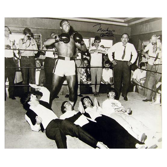 MUHAMMAD ALI: Cassius Clay (b.1942). An Olympic Gold Medal winner (1960), this boxing legend was the first boxer to win the world heavyweight title three times. SP, b/w, 20"x16" portrait of his famed humorous photo