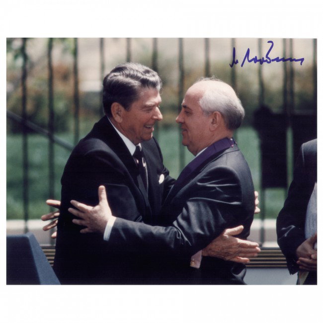 MIKHAIL GORBACHEV: (b. 1931). President of USSR (1985-91) who introduced reforms in Soviet Union awarded the 1990 Nobel Peace Prize for his efforts in helping to end cold war. SP, color, 10"x8" photo still of famed embr