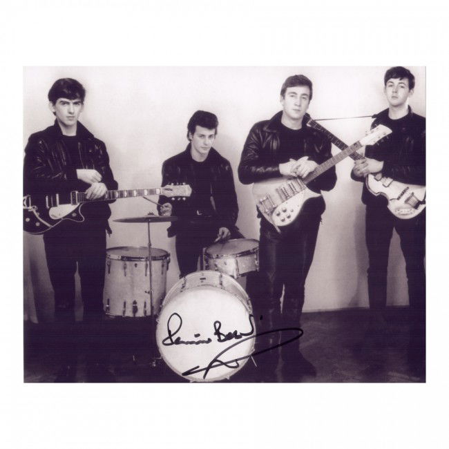 PETER BEST: (b. 1941). Original drummer in The Beatles rock group replaced by Ringo Starr after 1962. Reproduced SP, b/w, 10"x8" group portriat of early Beatles. Boldly signed in black felt tip on drum set. Fine.