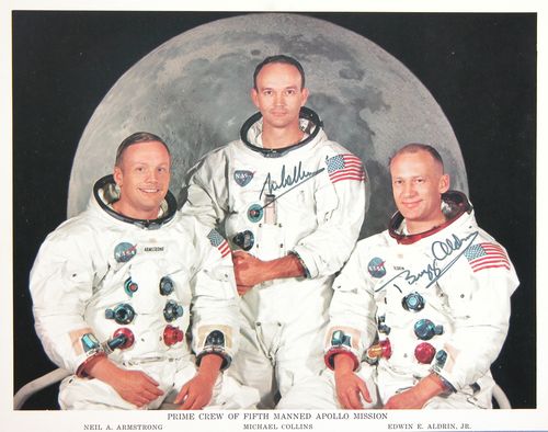 [APOLLO XI]: 398. [APOLLO XI] In 1969 this mission performed the first manned lunar landing enabling the first men to walk on the moon. Printed NASA SP, color, 10"x8" portrait of crewmembers Neil Armstrong; pilot