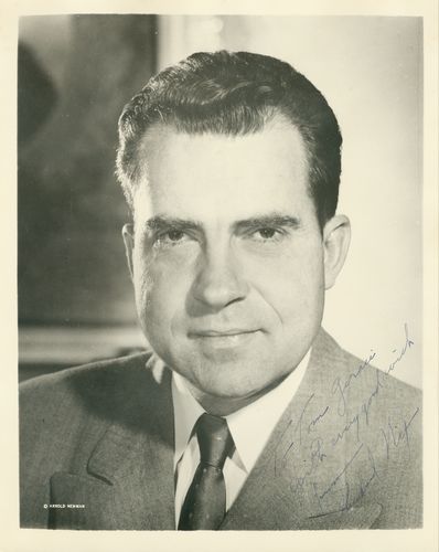 RICHARD M. NIXON: 467. RICHARD M. NIXON ISP [Arnold Newman], b/w matte, 8"x10" quarter-length portrait. Boldly signed in blue ink across image, adding sentiment "with every good wish from..." Minor wrinkling at top bor
