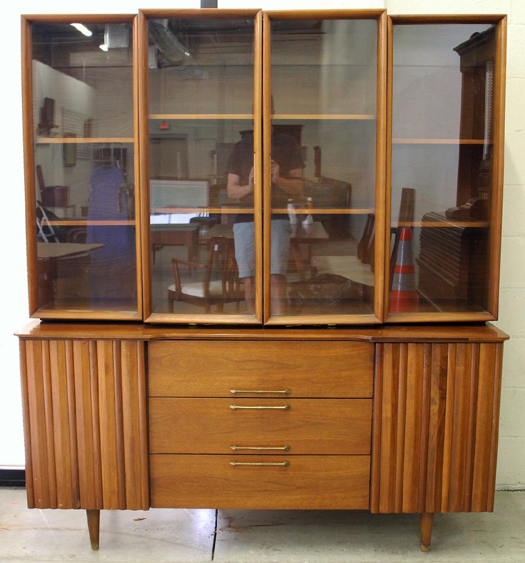 MID CENTURY MODERN CABINET: Mid Century Modern cabinet or credenza. Top is removable. Measures 62" wide 20" deep 30.5" to top of credenza and 70.75" with cabinet.