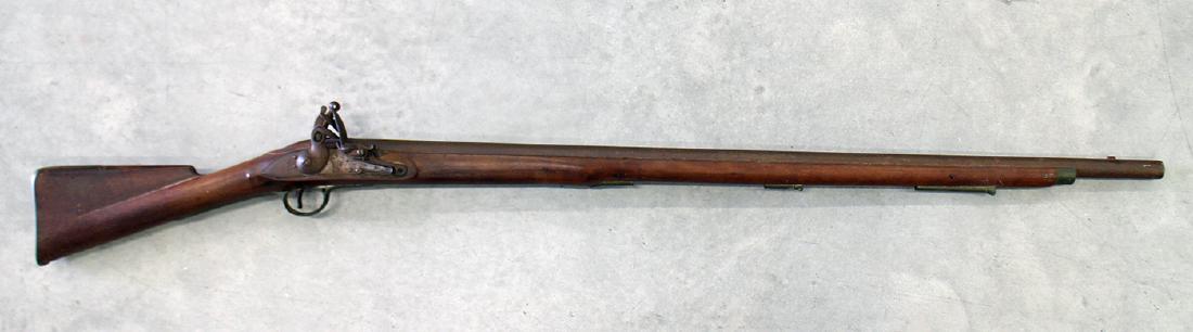 BRITISH FLINTLOCK CAVALRY CARBINE MUSKET: Revolutionary war period (?) British flintlock cavalry carbine rifle. Hallmarked with a crown and GR, along with various other markings. Measures 54 3/4" long. Will only be shipped through FFL dealer.