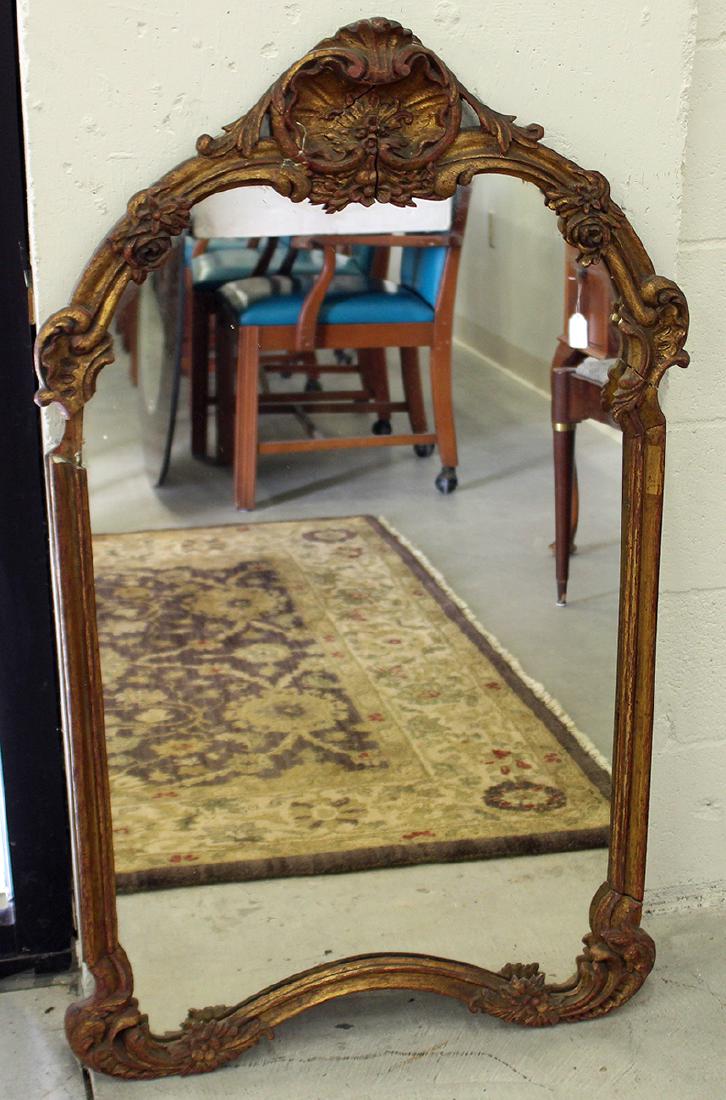 19TH CENTURY MIRROR: Antique Rococo style mirror with flower accents. Missing piece on left side, age related wear. 42.5" x 24.5"