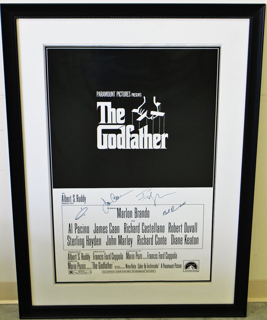 THE GODFATHER AUTOGRAPHED FRAMED POSTER: The Godfather movie poster autographed by Al Pacino, James Caan, Robert Duvall, and Francis Ford Coppola. Poster measures 38" x 25" and 50" x 36 1/2" w/ frame.