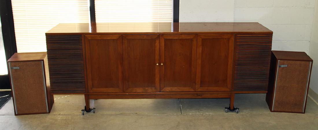 MID CENTURY SPEAKER CABINET: Mid Century Modern speaker cabinet. Cabinet has built in speakers and includes additional Lancer 77 speakers. Measures 88" x 20" wide 34.5" tall. Cabinet is working and includes equipment.