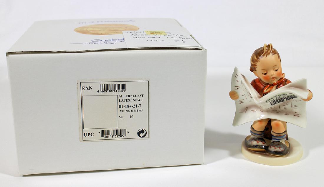 HUMMEL "LATEST NEWS" SUPER BOWL XXXI PACKERS WIN: Goebel Hummel "Latest News" figurine reading a paper - Packers beat Patriots in the 1997 Super Bowl XXXI 35-21.