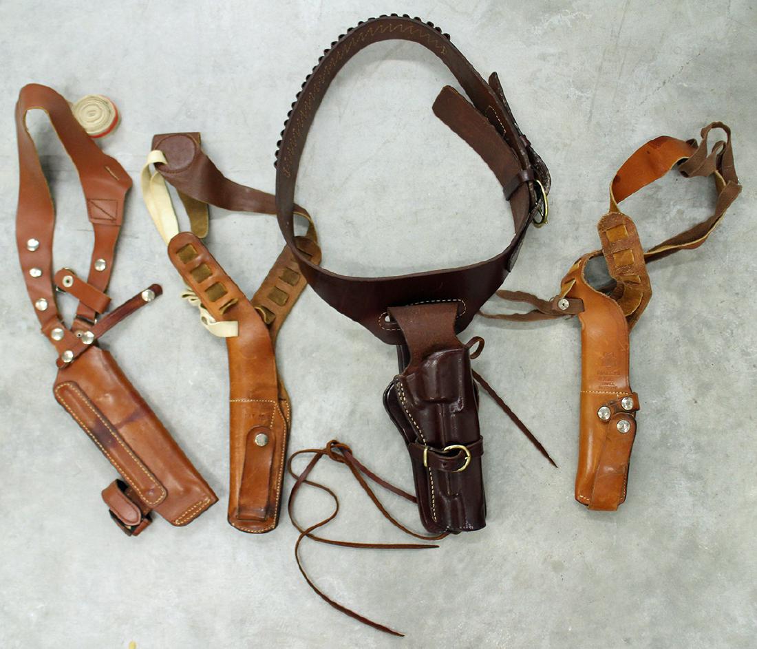TRIPLE K, BIANCHI AND SMITH & WESSON HOLSTERS: A western Triple K leather gun holster, (2) Bianchi X15 leather shoulder holsters and a Smith & Wesson 43 26 leather holster.