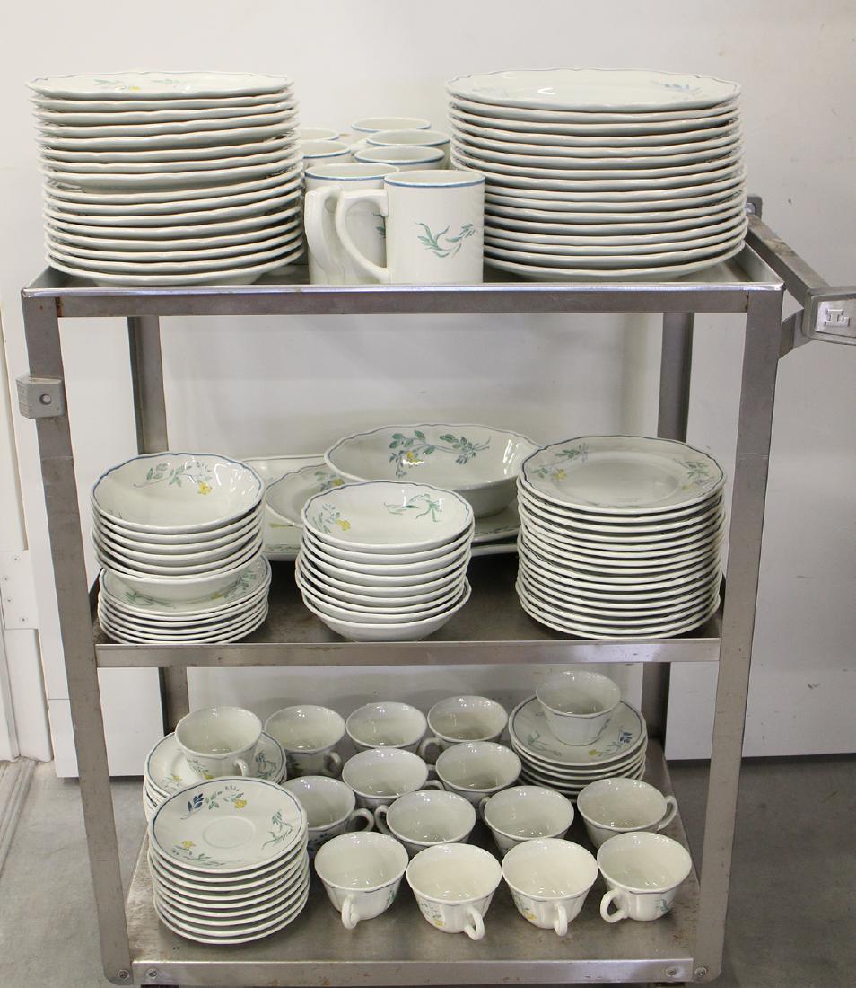 107 PIECE LONGCHAMP FRANCE CHINA - MEDITERRANEAN: Late 19th Early 20th Century Longchamp China from Dijon France in the Mediterranean pattern. There is a fish pattern in the center with a scalloped blue band and yellow flowers. Includes 16 dinner pla