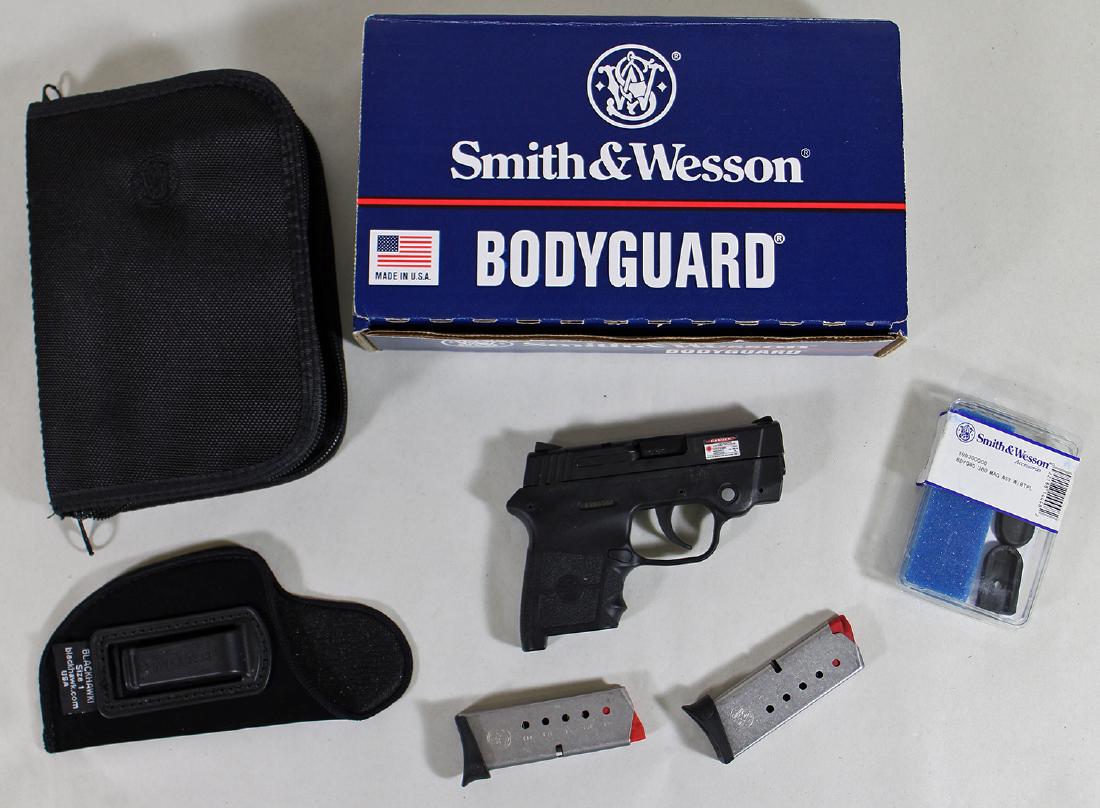 SMITH & WESSON 380 HANDGUN W/ BOX: Smith & Wesson .380 Bodyguard pistol with box. Gun has red light laser. PURCHASE OF FIREARMS IS SUBJECT TO FFL TRANSER. FIREARMS THAT PREDATE 1898 ARE NOT SUBJECT TO FFL. IT IS THE BUYER'S RESPONSIBIL