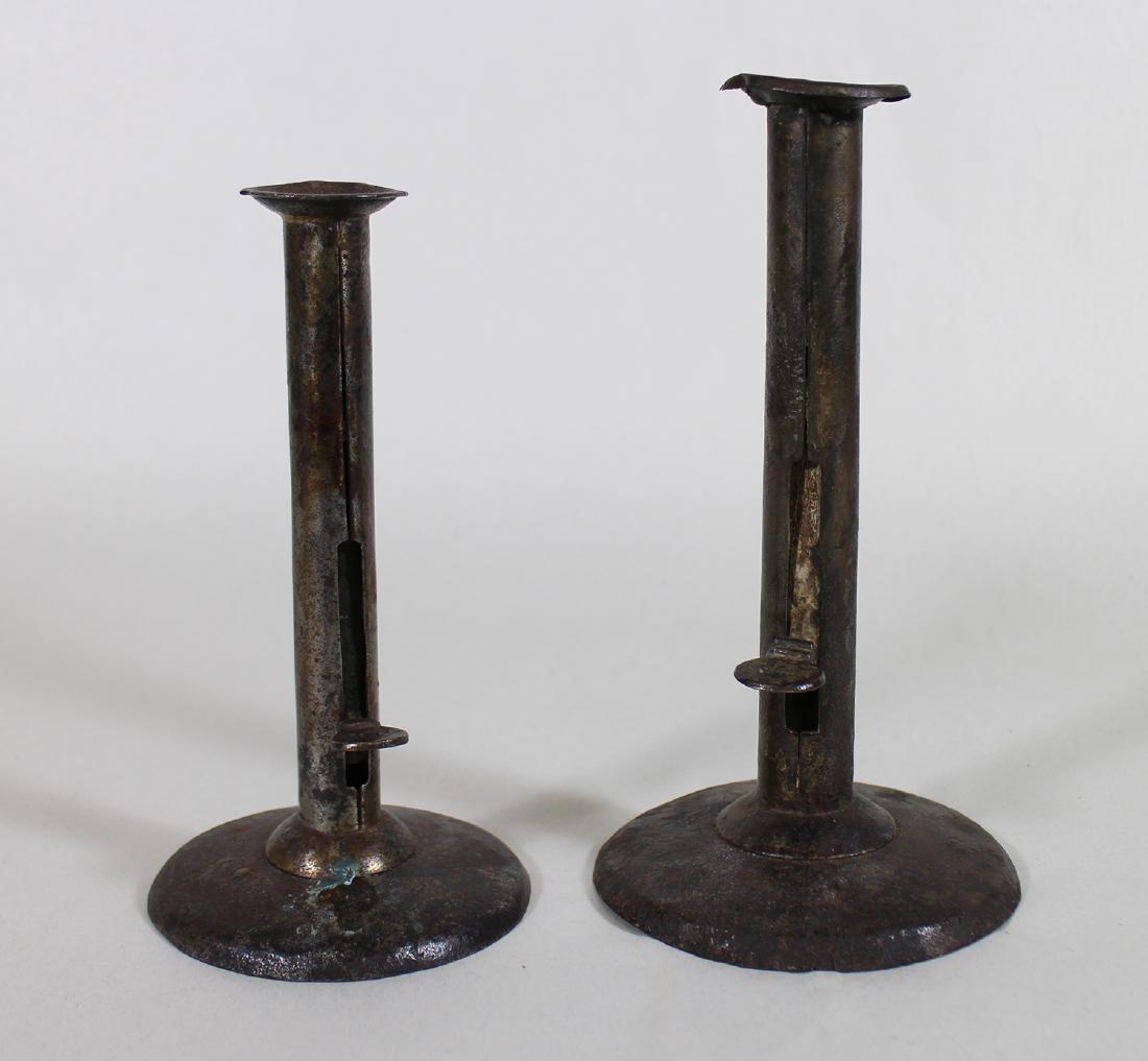 18th/19th C IRON HOGSCRAPER PUSH UP CANDLESTICKS (1 of 4)