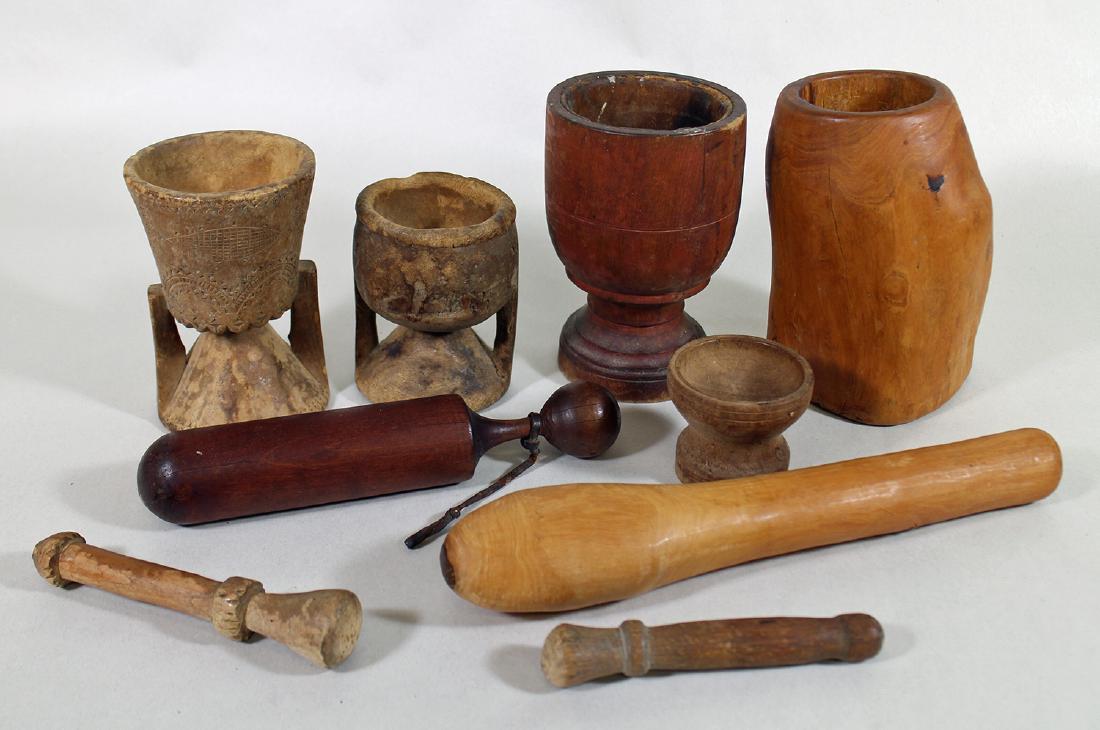 COLLECTION OF EARLY AMERICAN WOOD MORTAR & PESTLES: Includes 5 mortar and pestles in various sizes from 2 1/2" tall to 8" tall.