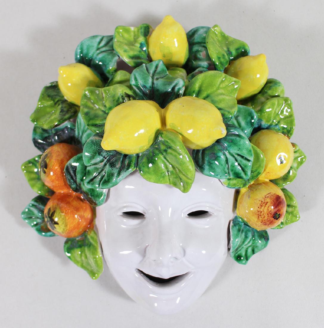 MAJOLICA STYLE WALL MASK: Majolica style wall mask with lemons. 9" long.