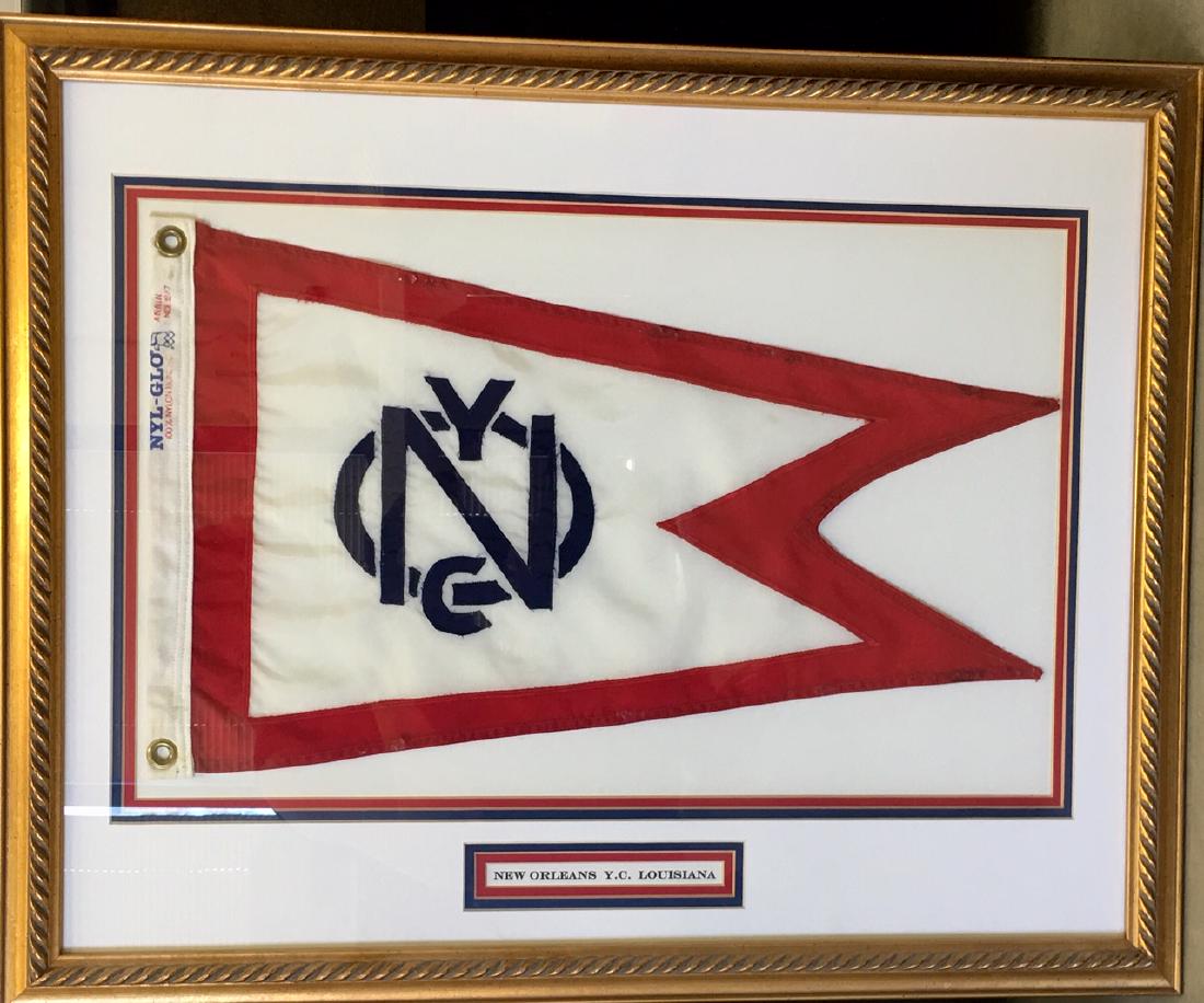 NEW ORLEANS YACHT CLUB LOUISIANA FRAMED BURGEE: Professionally framed flag with name plaque. 22" x 28"