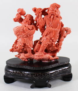 CHINESE CORAL CARVING: Highly detailed Chinese coral carving of two fisherman with shell and fish accents. Carving measures 5.75" wide 5" tall and 6.5" wide 7" tall with stand.