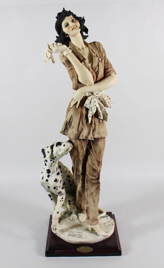 GIUSEPPE ARMANI MARINA FIGURINE: Giuseppe Armani Marina woman with dog figurine # 649C 649 C. Measures 18.75" tall. Numbered 981/5000. Includes original box.