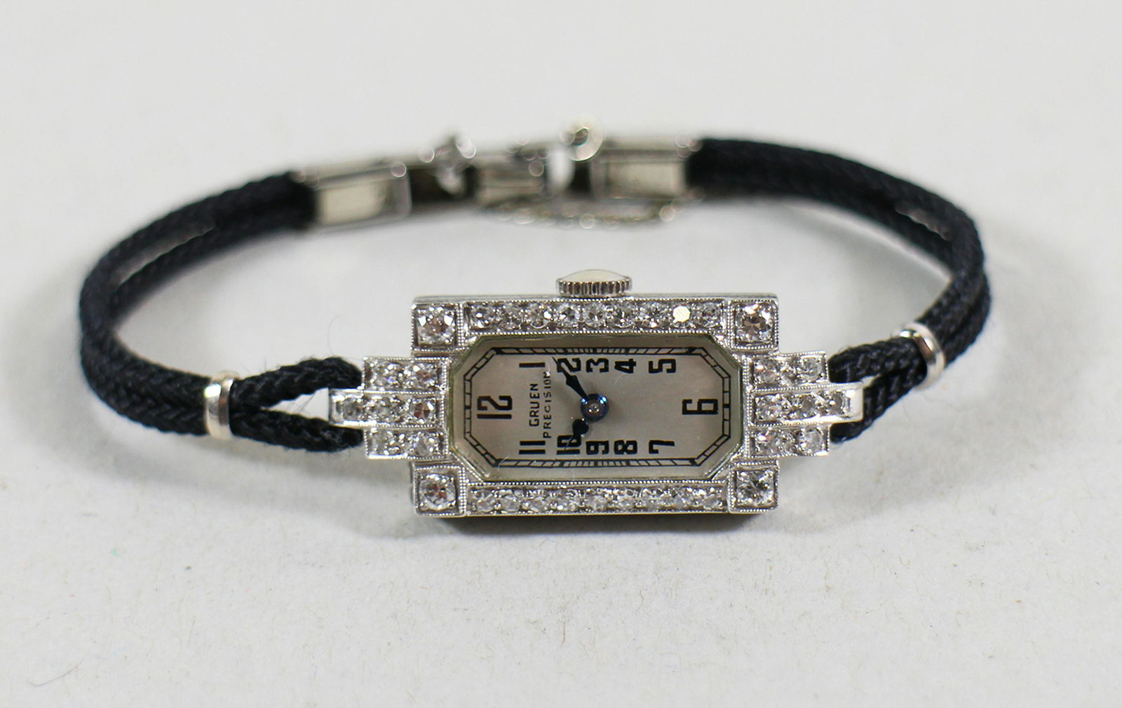GRUEN ART DECO PLATINUM & DIAMOND WATCH: Ladies Art Deco Gruen platinum and diamond wristwatch. Band approximately 5"