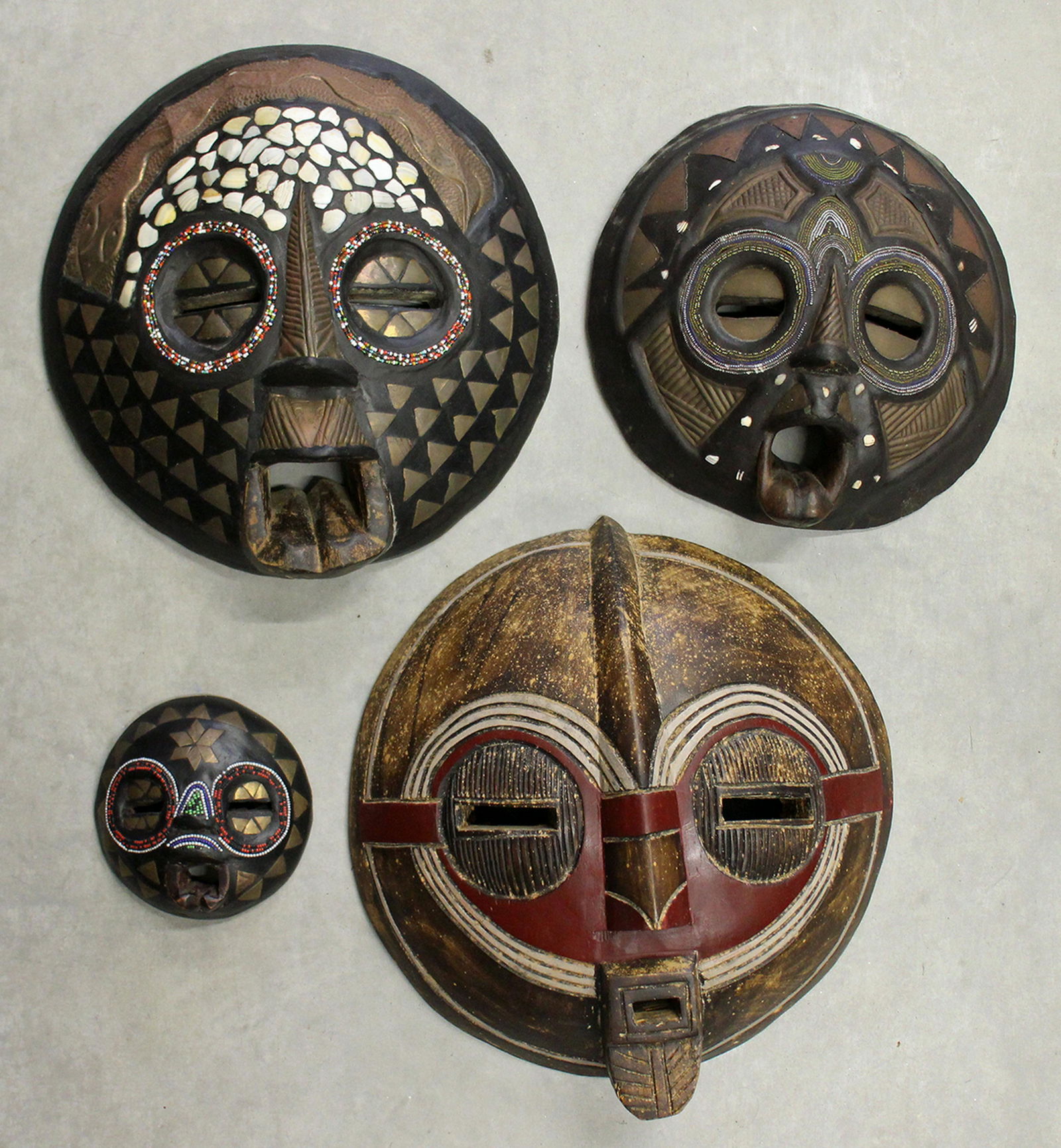 (4) CARVED AFRICAN BAULE SUN MASKS (1 of 3)