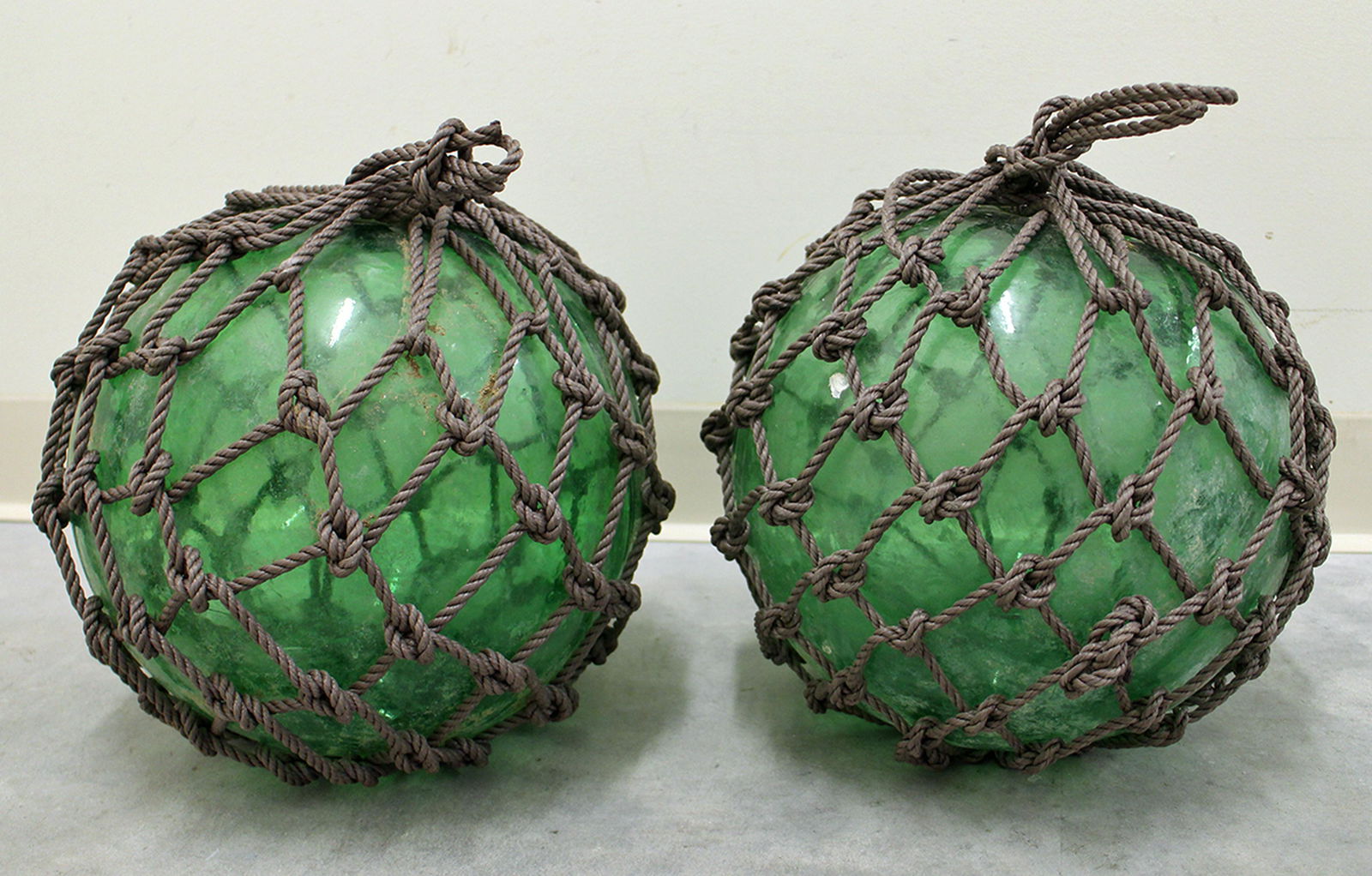 (2) GREEN GLASS ROPE BUOY BALLS (1 of 1)