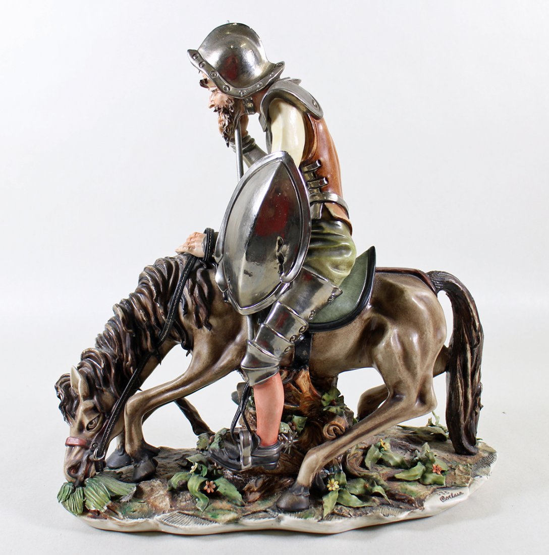 CAPODIMONTE DON QUIXOTE SCULPTURE: Capodimonte Don Quixote on horseback sculpture. Measures 10.5" wide 11" tall.