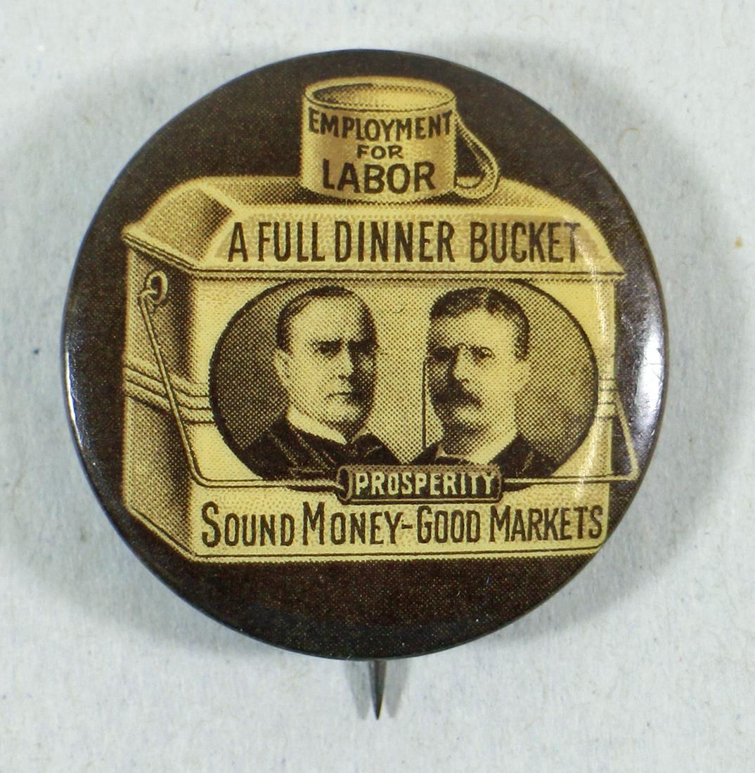 1900 MCKINLEY & ROOSEVELT JUGATE CAMPAIGN PINBACK: A presidential campaign button featuring Mckinley and Roosevelt inside a metal lunch pail with the slogan, "Employment for Labor", "A Full Dinner Bucket, Prosperity, Sound Money, Good Markets." It is