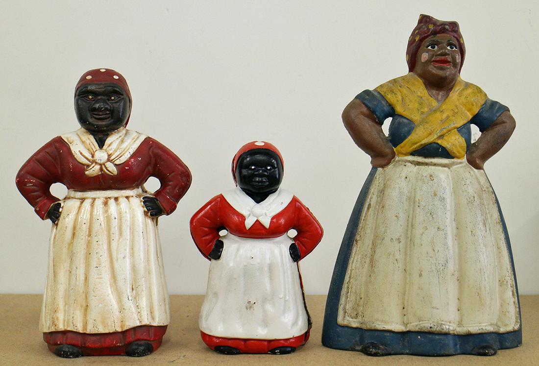 (3) CAST IRON MAMMY BANKS & DOORSTOPS: They range in size from 13" to 8"