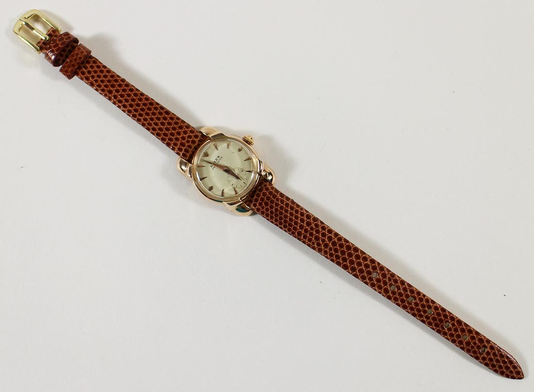 LADY'S ROLEX ROSE & YELLOW 18K GOLD WATCH: Ladies Rolex Precision rare two tone rose & yellow gold 18KT wristwatch. 17 Jewel mechanical wind, movement marked Rolex 1948 Ca. 6240, 17 jewels, patented super balance. Inside of case marked Geneve