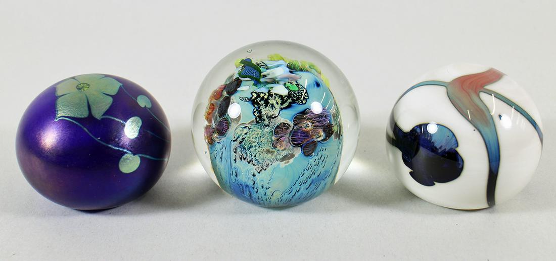 (3) ART GLASS PAPERWEIGHTS: Three art glass paperweights. Josh Simpson, Daniel Salazar Lundberg Studios DSLS, and Byron. 2.5" to 3" wide.