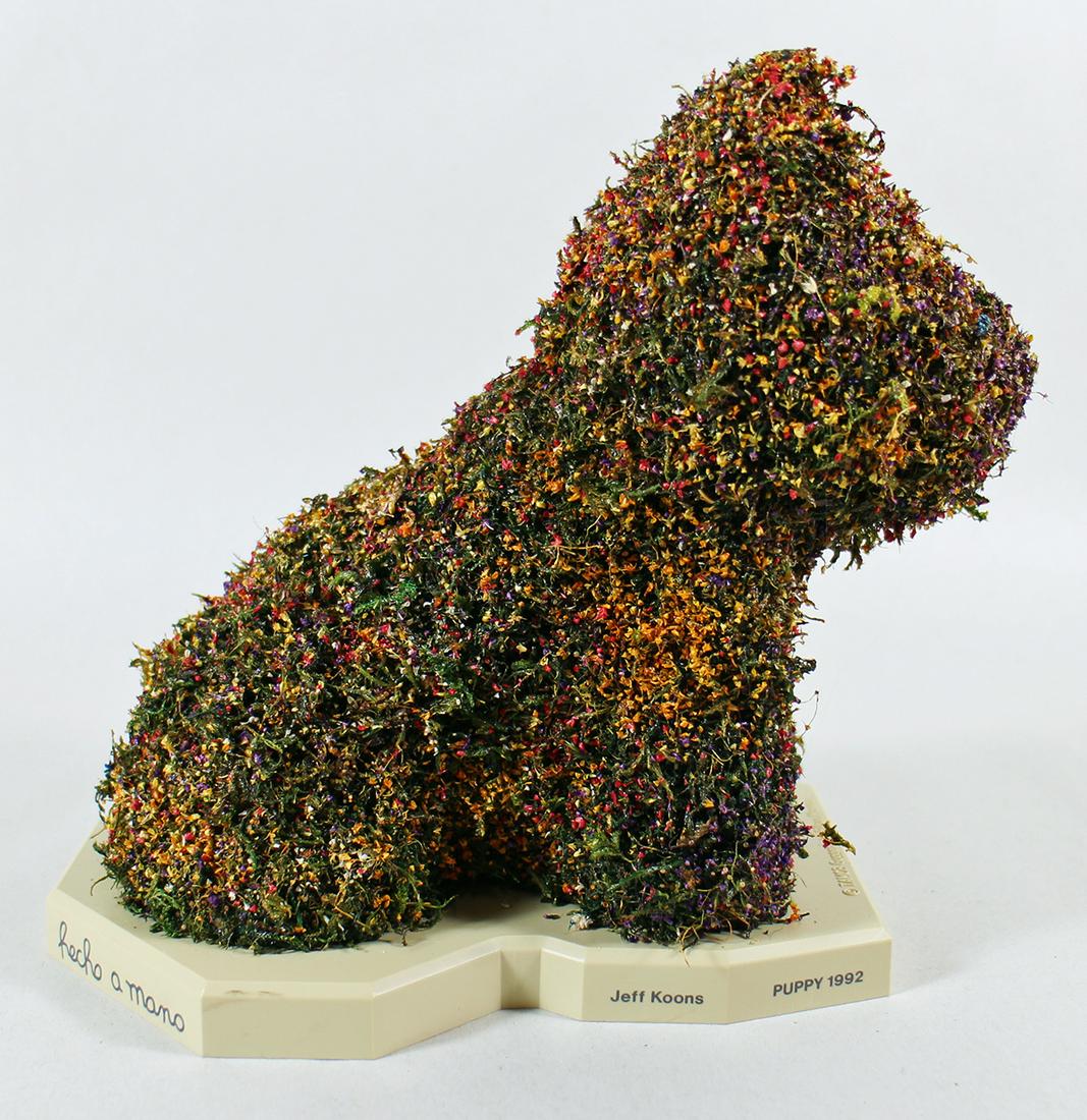 JEFF KOONS FLOWER PUPPY SCULPTURE: Jeff Koons (b.1955) Hecho A Mano 1992 Flower Puppy sculpture of resin, plastic, and dried flowers. Includes original plastic case and mirrored display case. Measures 7" wide 7.25" tall.