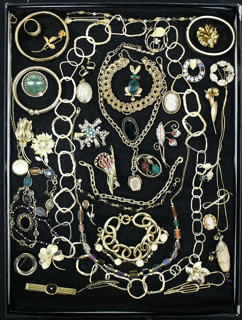 VINTAGE & ANTIQUE GOLD FILLED JEWELRY: Collection of Victorian and vintage gold filled jewelry to include watch fob and chain, lockets, ring, earrings, brooches, necklaces, bracelets, and more.