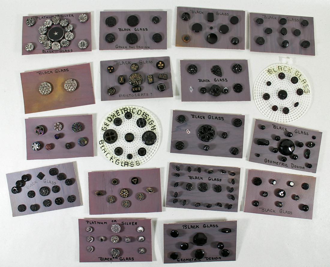 ANTIQUE BLACK GLASS BUTTON COLLECTION: Large collection of assorted black glass buttons to include Aristocrats, Intaglio, Platinum Silver on glass, Greek Key and much more,.