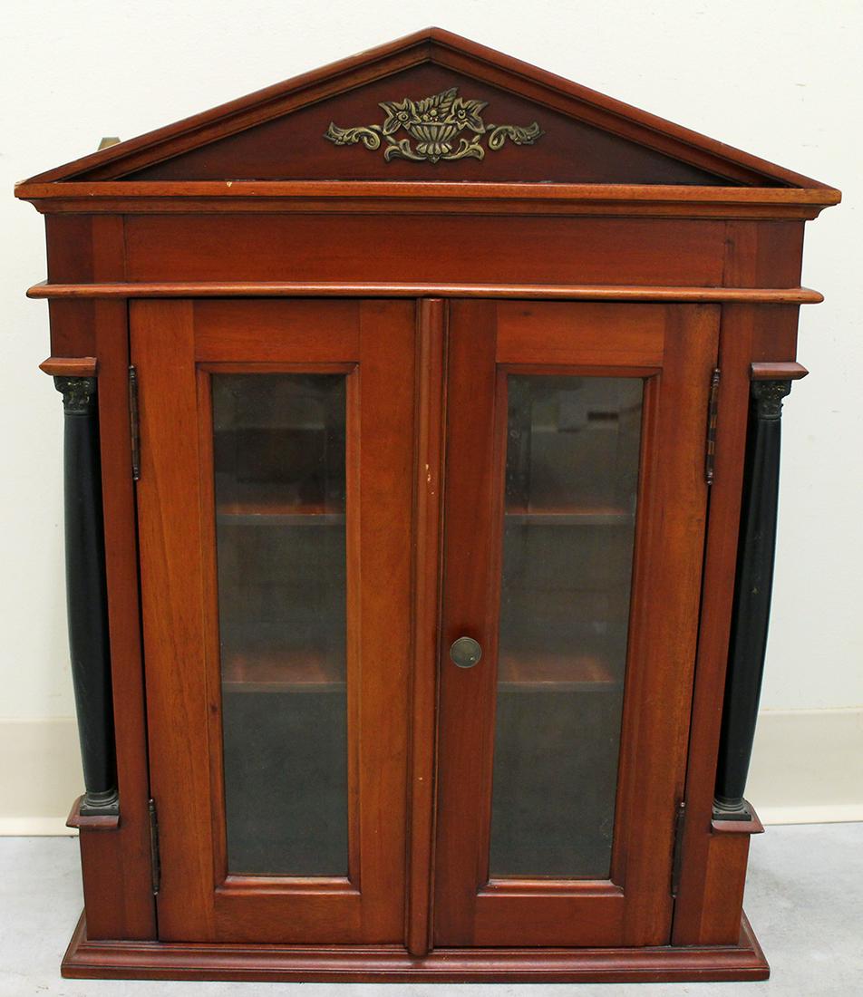 WALL CURIO CABINET: Wall display curio cabinet with two doors. Measures 24.75" tall 19.5" wide.