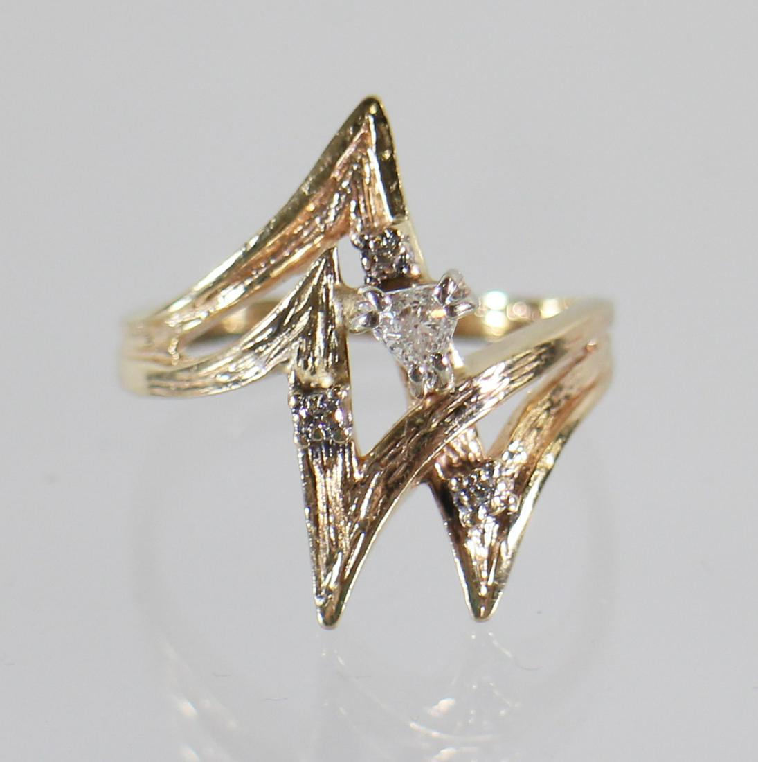 10K MODERNISTIC TRILLION CUT DIAMOND RING (1 of 3)