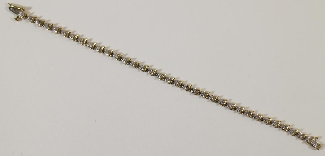 10K DIAMOND TENNIS BRACELET (1 of 2)