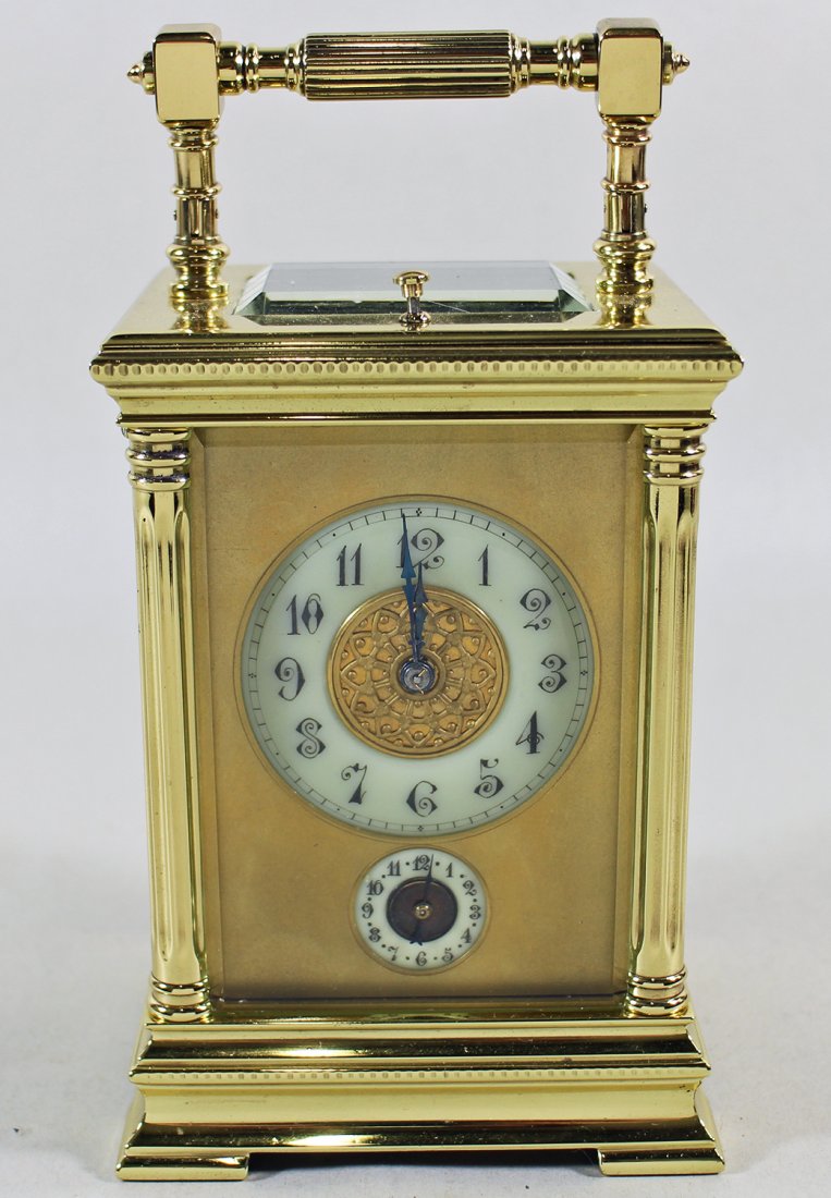 19TH CENTURY GRAND SONNERIE CLOCK: Late 1800's French Grand Sonnerie carriage clock. Measures 5.5" tall without handle. Chip to bottom corner of glass on back.