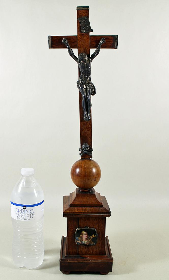 WOOD CRUCIFIX: Wood & metal crucifix with skull and cross bones and small portrait at bottom. 20.5" tall.