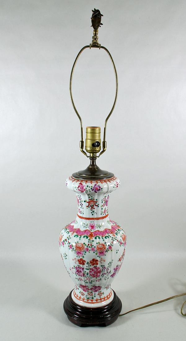 PINK FLORAL PORCELAIN LAMP: A table lamp with pink and peach flowers on a white background. It measures 25" to top (17" w/o harp)