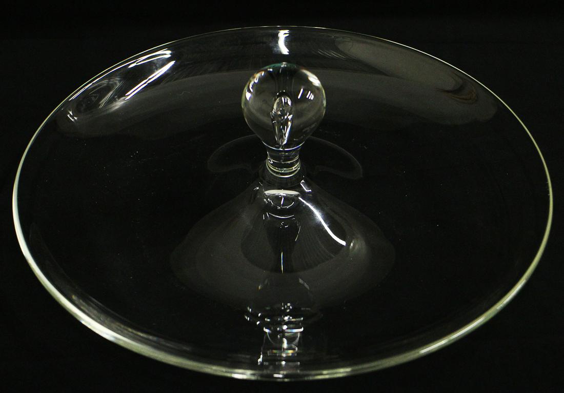 STEUBEN HANDLED CANAPE TRAY: A Steuben tidbit dish with handle and teardrop. 11"