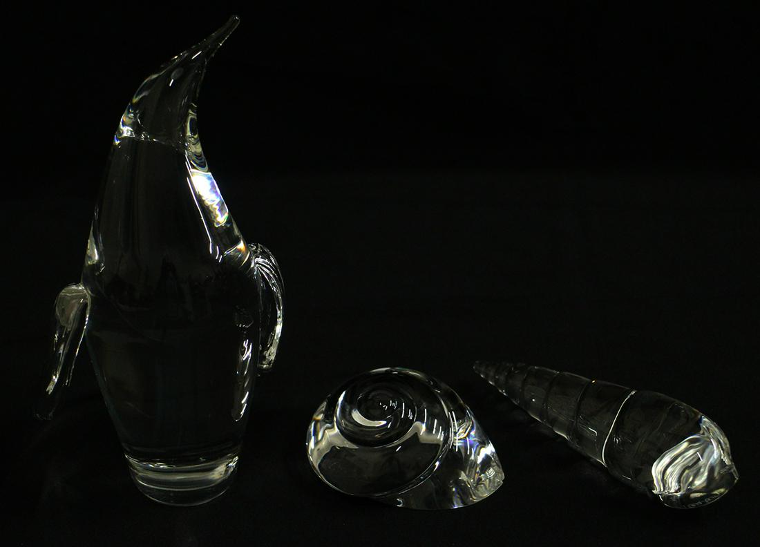 3 PC STEUBEN COLLECTION: Steuben penguin (chip to tail) and two shell paperweights (one with chip, longer shell no damage).