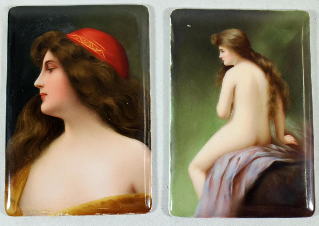 (2) KPM STYLE NUDE PORCELAIN PLAQUES - WAGNER: A pair of painted porcelain plaques of Victorian ladies. One is a nude with long flowing hair and is unsigned. The other is a lovely lady with a red hat signed Wagner. They measure 5 3/4" x 4"