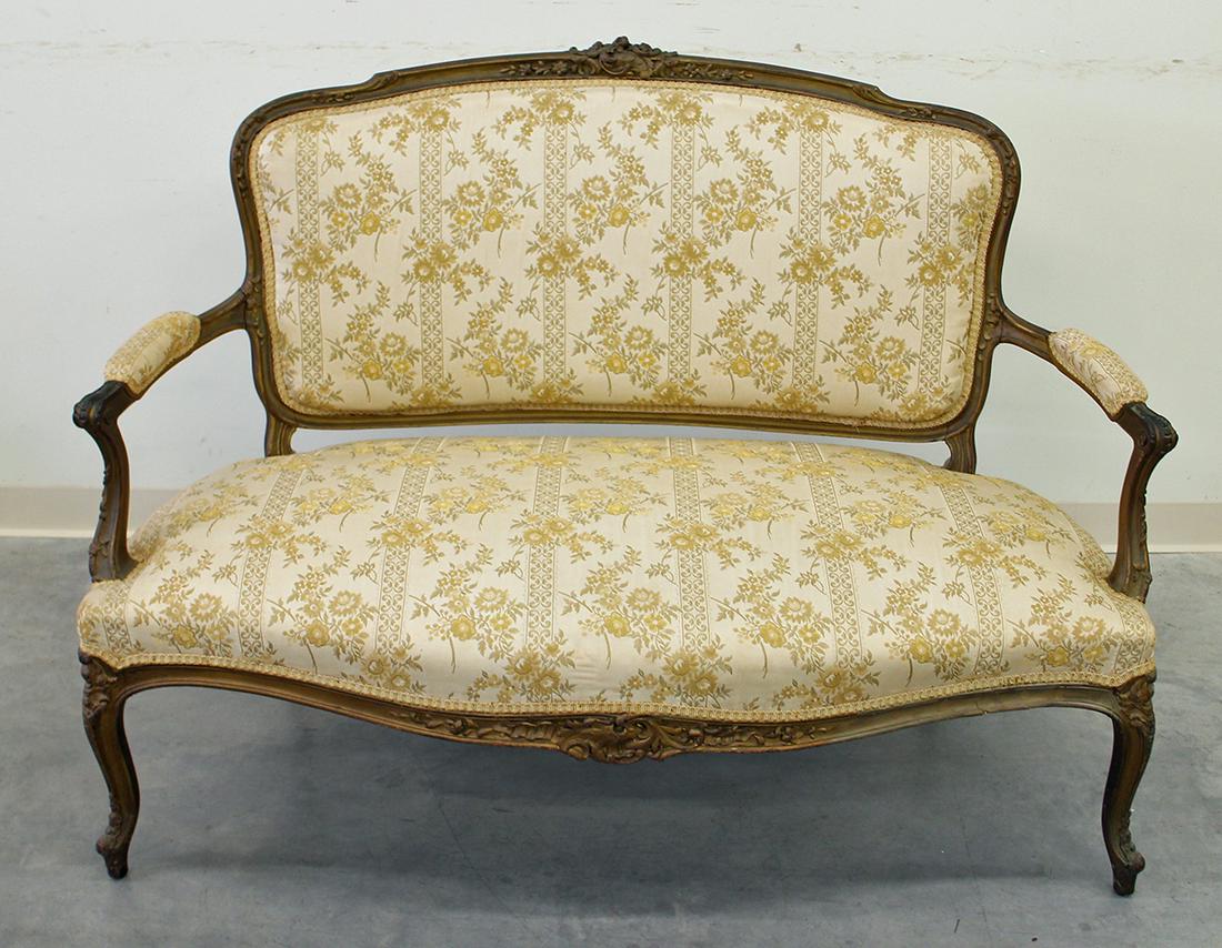ANTIQUE FRENCH LOVESEAT: Antique French upholstered loveseat. Measures 53" x 24" wide.