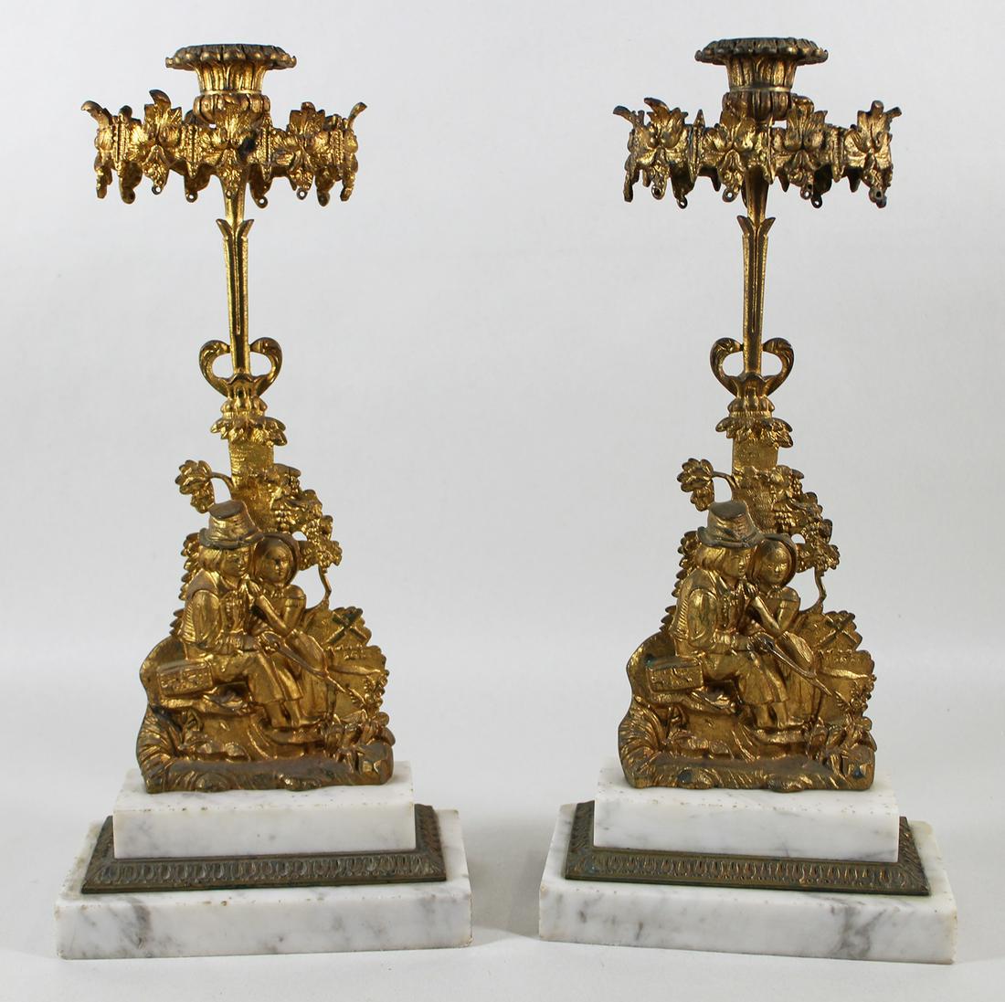 (2) GILT FIGURAL CANDLESTICKS (1 of 2)