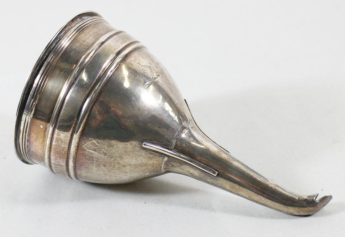 GEORGIAN STERLING SILVER WINE FUNNEL: Georgian sterling silver hallmarked two piece wine funnel. Shell with star inside crest. 6.25" long, 4.9 OZT.
