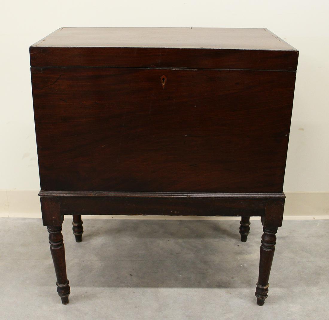 19TH CENTURY CELLARETTE: 19th Century locking wood cellarette with eight compartments. Some scratches to top, age related wear. Measures 22" x 13" wide 26.5" tall.