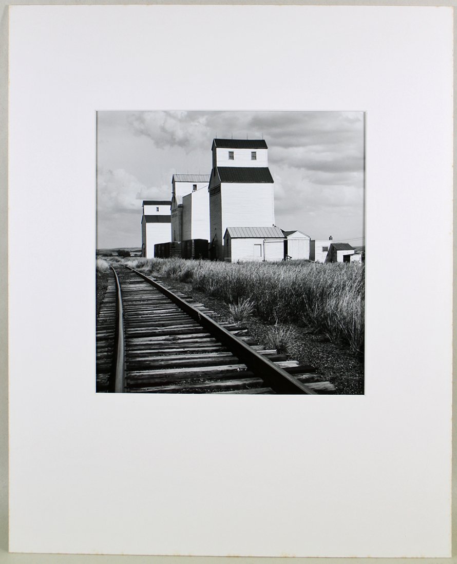 DAVID PLOWDEN GOLDEN VALLEY N.D. PHOTOGRAPH: David Plowden (b. 1932) Black and white photograph Golden Valley North Dakota. Signed on back with numbers, titled, and dated 1971. Measures 14" x 11". Matted, unframed.