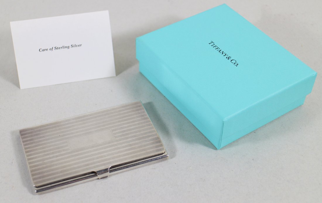TIFFANY & CO. STERLING BUSINESS CARD HOLDER: Tiffany and Co 1990's sterling silver business card holder with box. Some light scratches and wear.