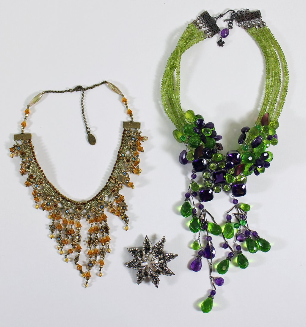 DESIGNER COSTUME JEWELRY: Includes a Michal Negrin necklace, a Miriam Haskell brooch, and a designer gemstone necklace.
