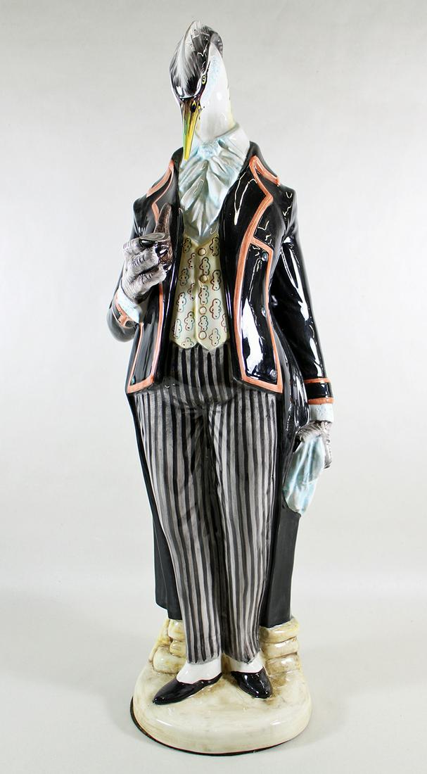 LARGE STANDING BIRD WITH PIPE SCULPTURE (1 of 3)