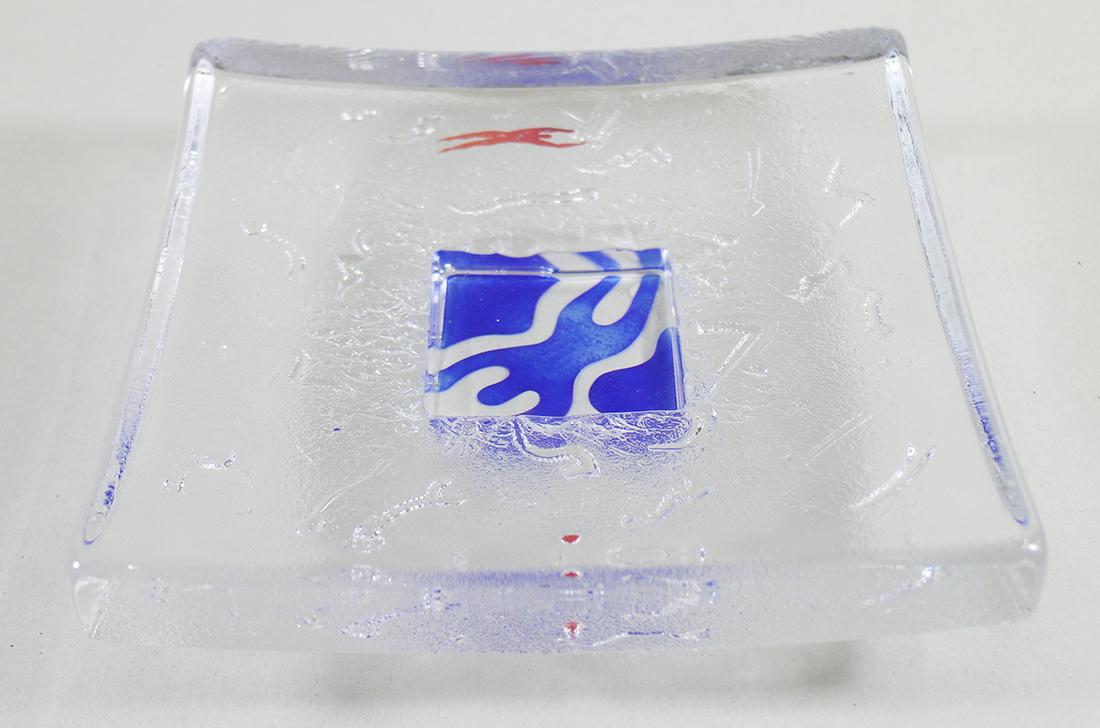 KOSTA BODA SWIMMERS SCULPTURE: Kosta Boda B Vallien signed "Swimmers" square glass sculpture. 8.5" x 8.5" wide.